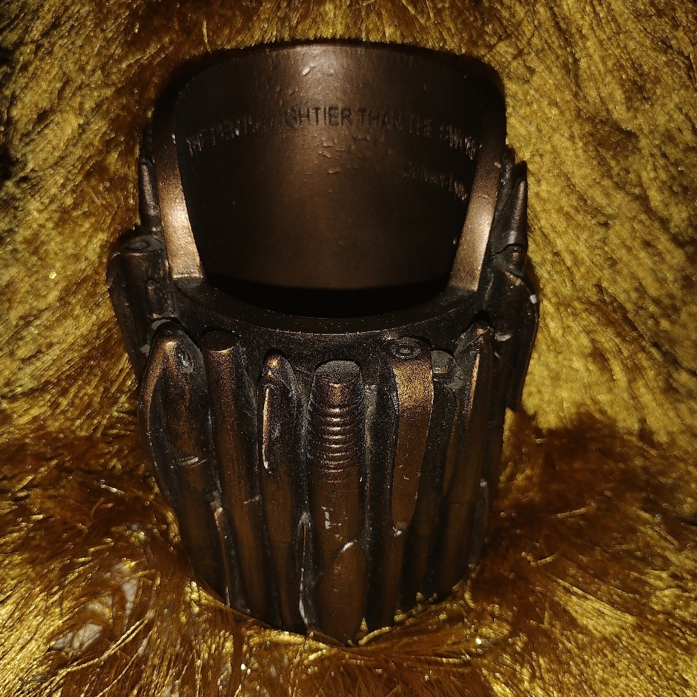 Pen holder cup.